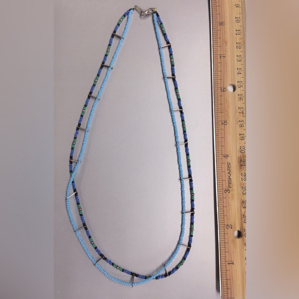Necklace made by prisoner in California.